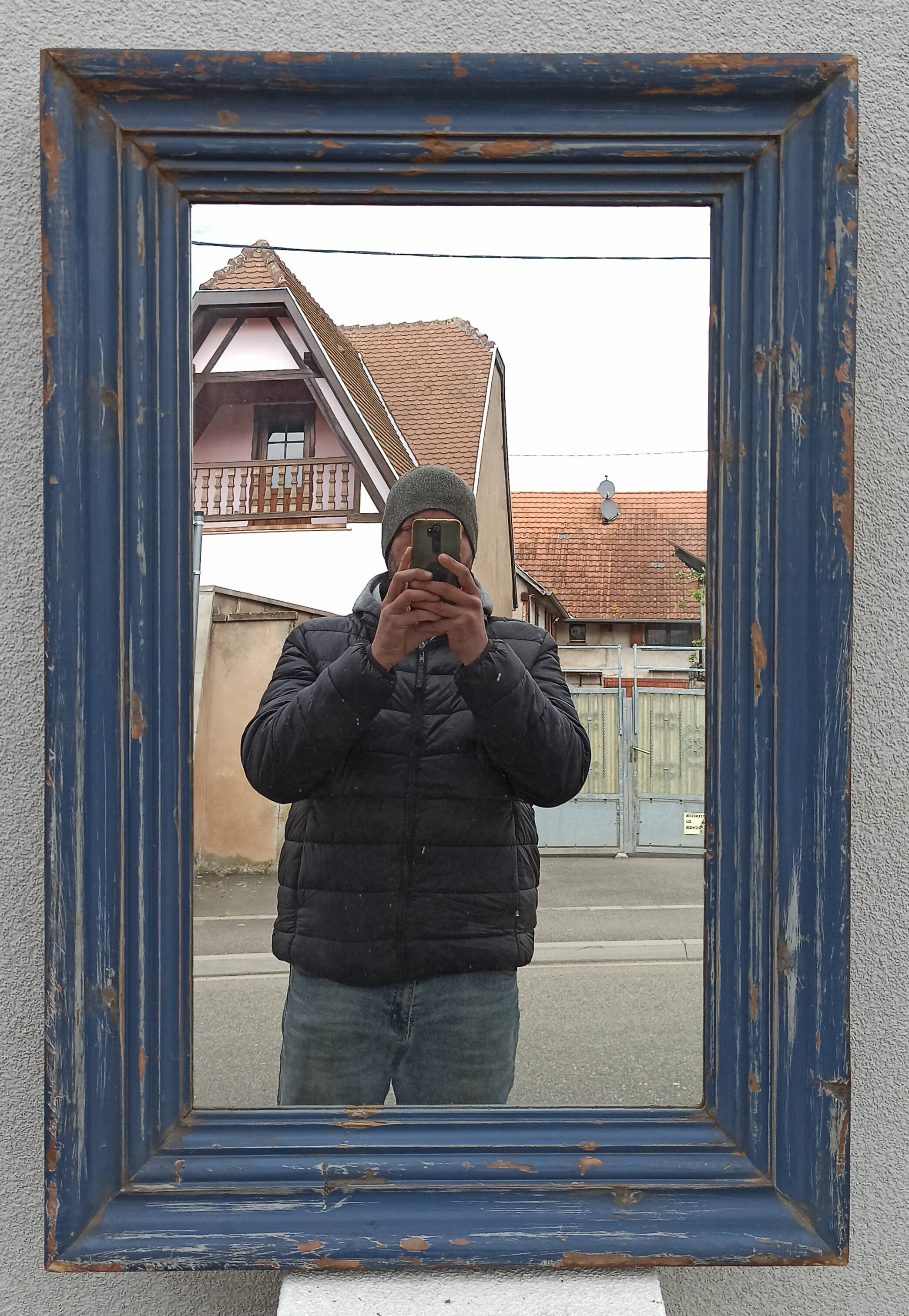 Old blue wooden mirror