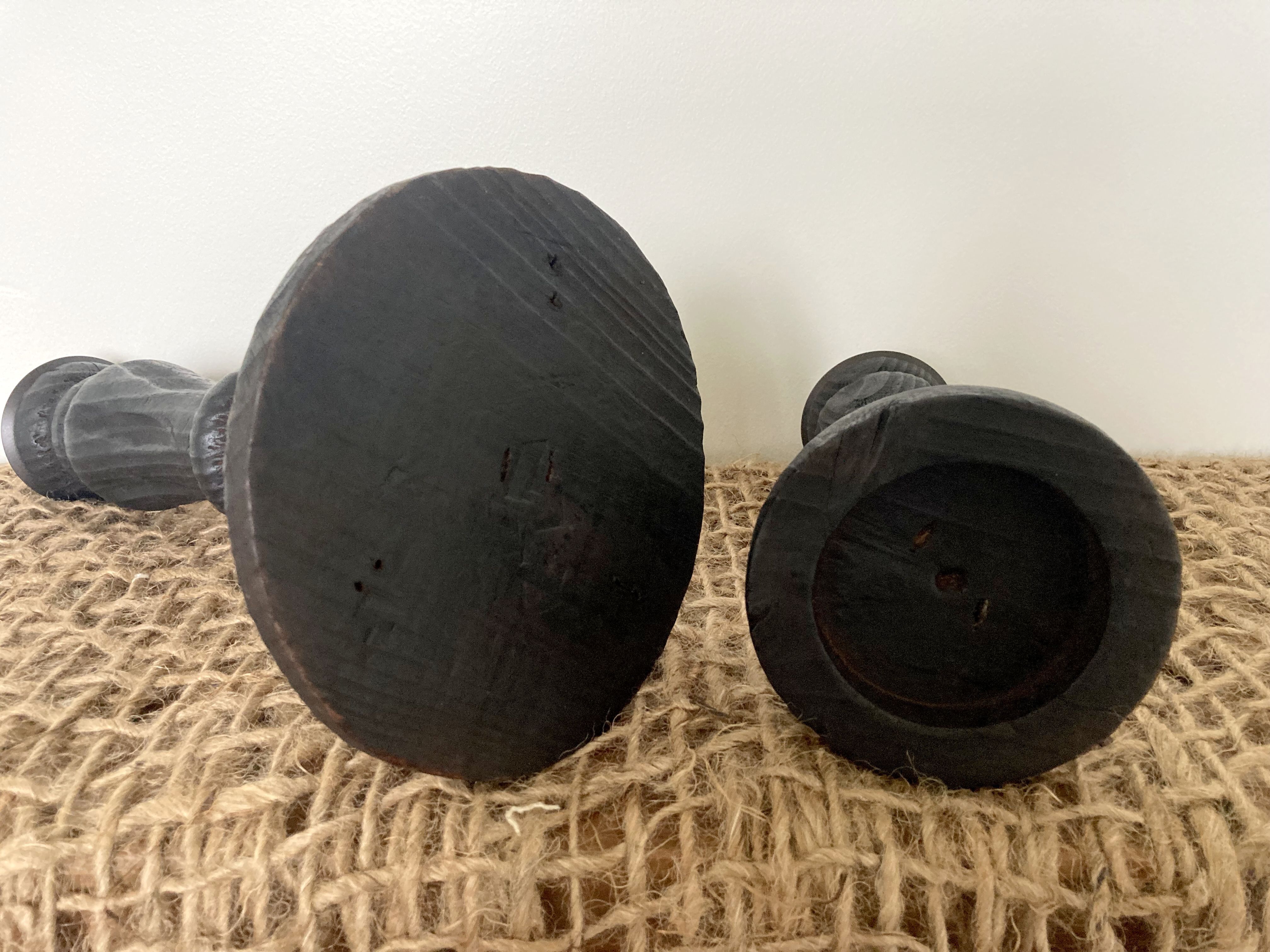 Black wooden candlesticks
