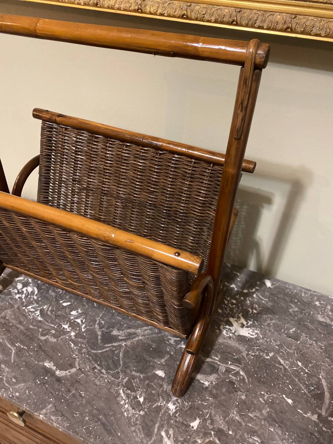 Wicker and brown wood magazine rack