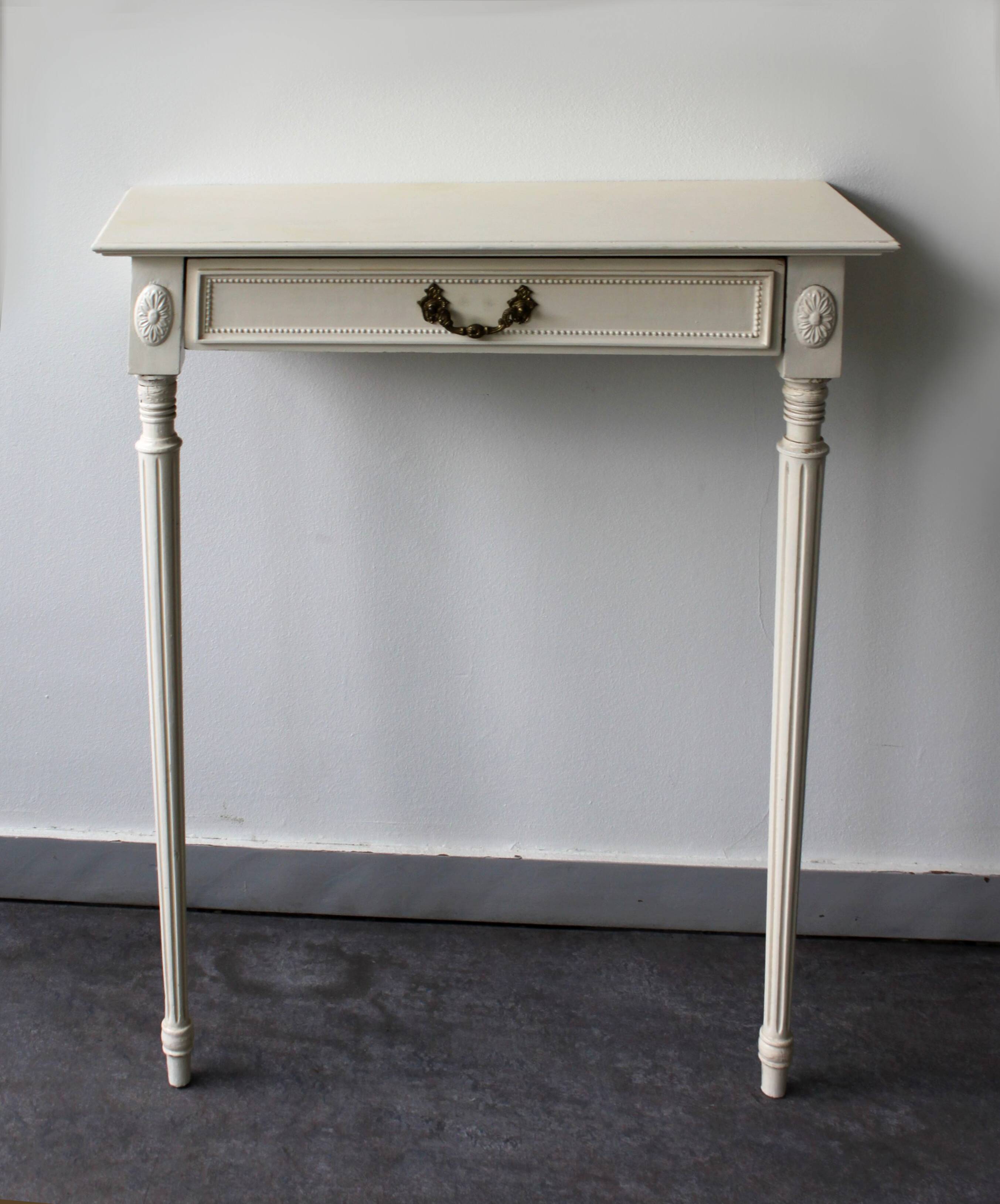 Two-legged wall console in Louis XVI style, painted wood.
