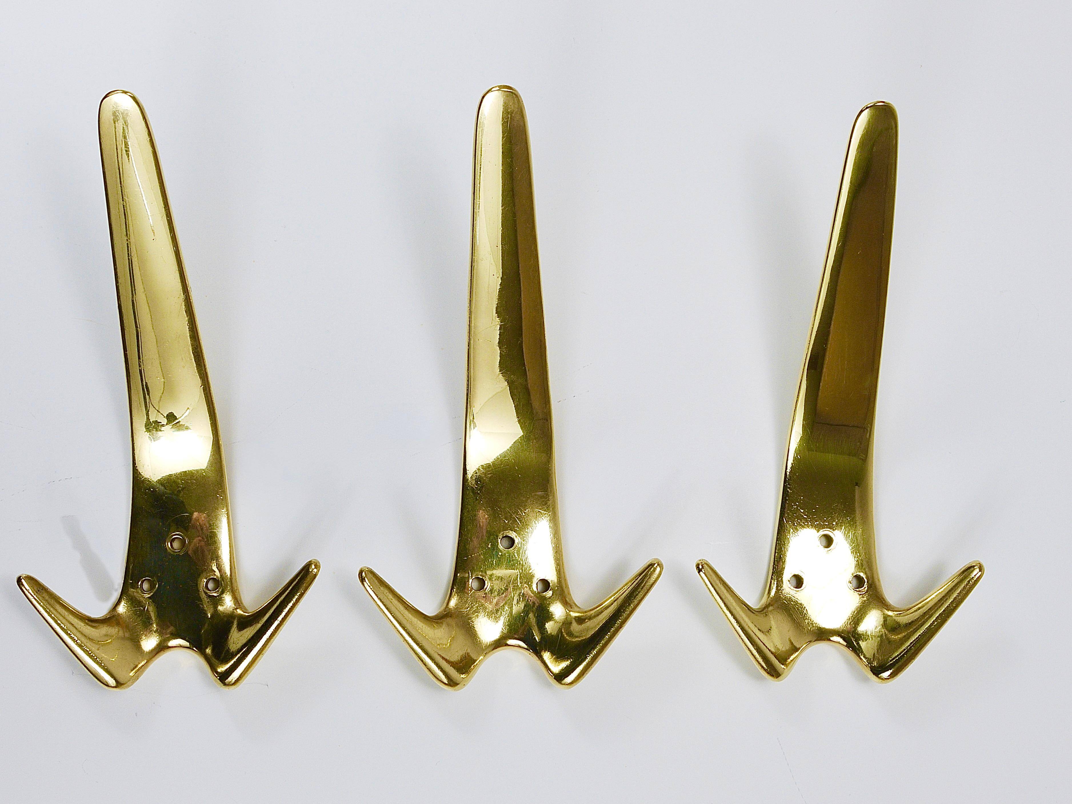 Up to 5 large vintage brass wall hooks by Carl Aubock #4056, Austria, 1950s.