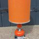 Designer lamp from the 70s in chrome metal and orange lacquered wood