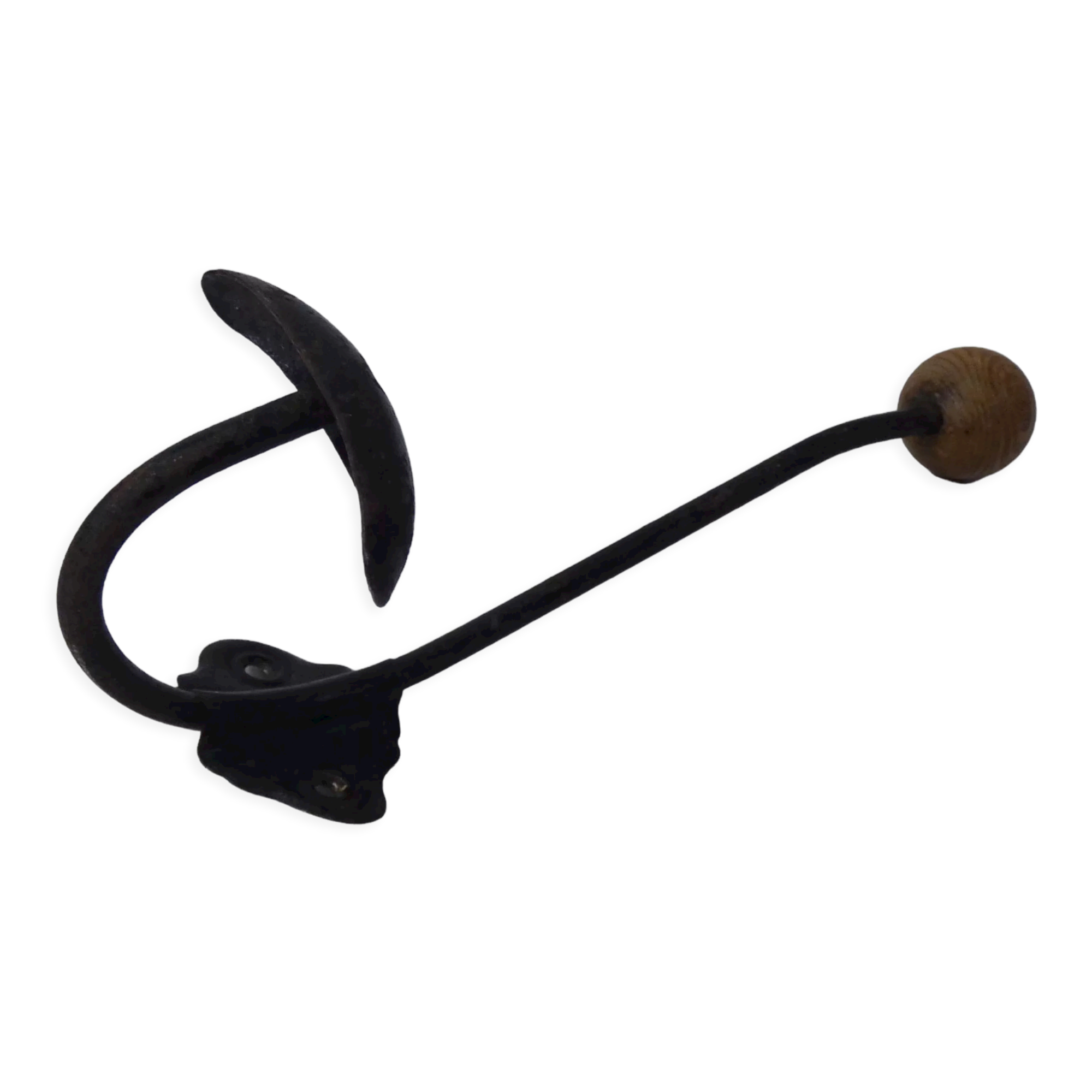 Old metal hook and wooden ball