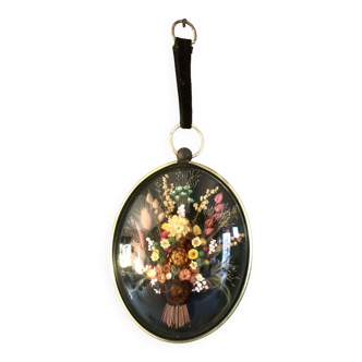 Domed medallion frame with dried flowers