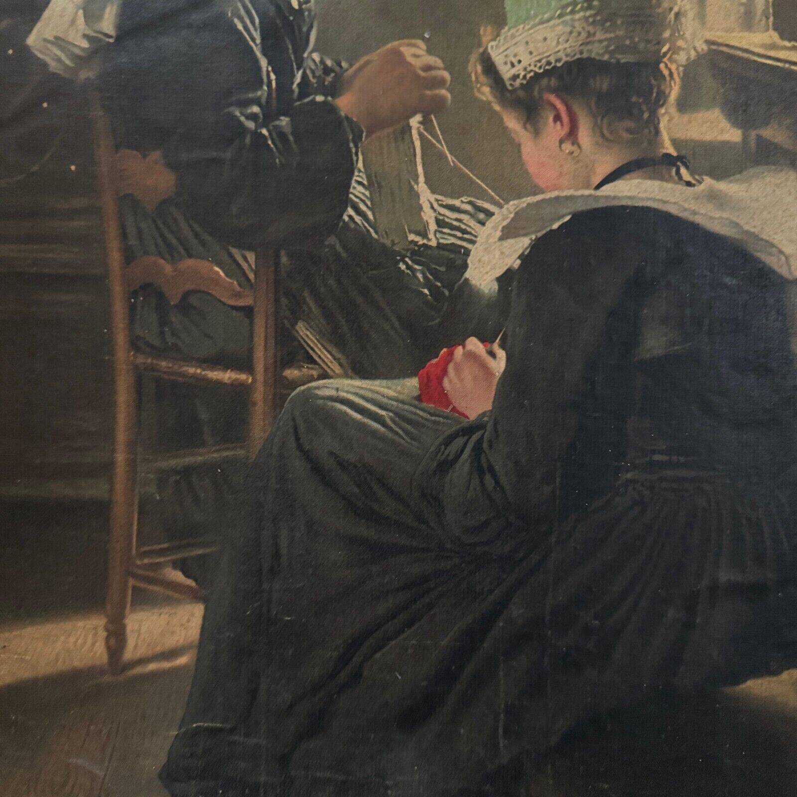 Sign read on cardboard illustrated with two Breton women in costume