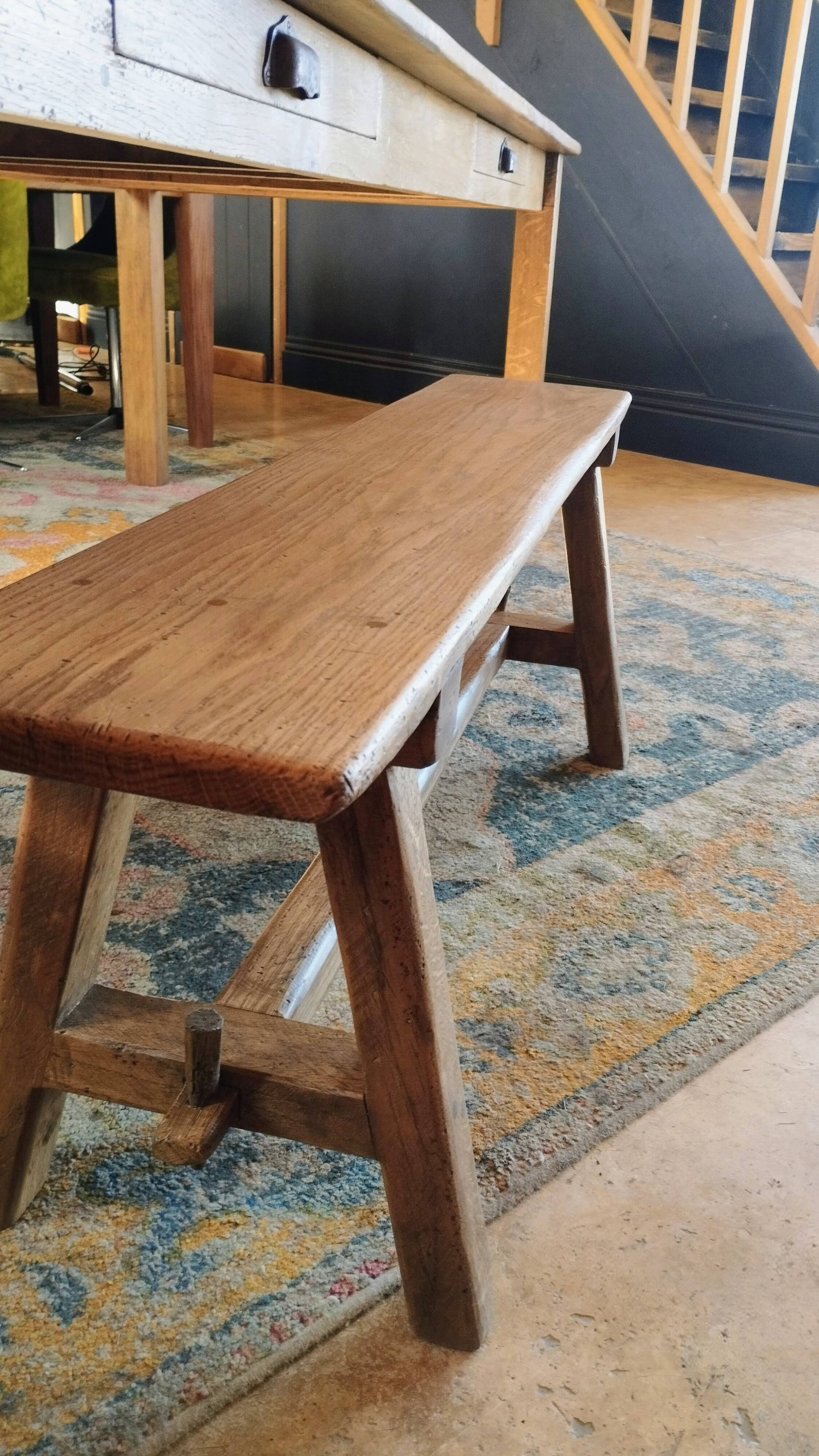 "A frame" bench in solid oak, patinated.