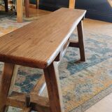 "A frame" bench in solid oak, patinated.