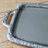 Vintage silver-plated metal tray with handles and embossed pattern