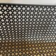 1950s black perforated metal planter in the style of Mathieu MATEGOT