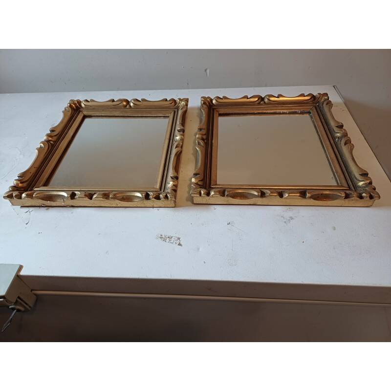 Pair of wood and gilded stucco mirrors