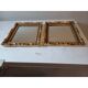 Pair of wood and gilded stucco mirrors