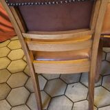 Table en noyer massif année 1930, pied central et 6 chaises en cuir cloutés