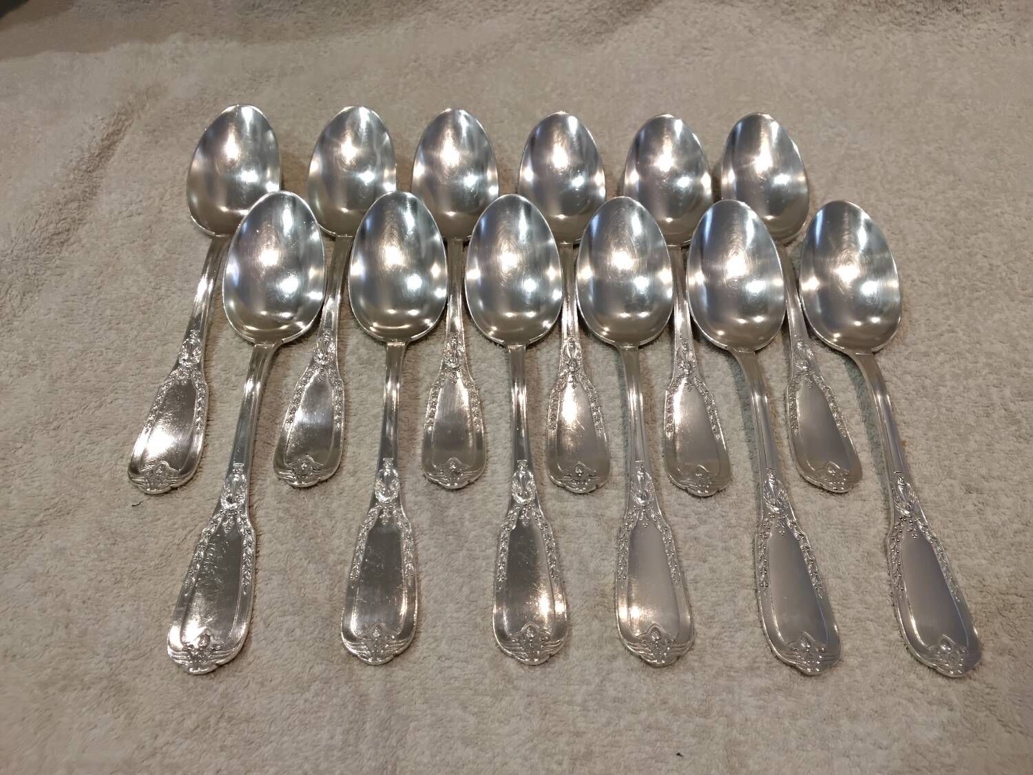 12 silver-plated metal soup spoons by Ravinet & Cie, Empire 81.