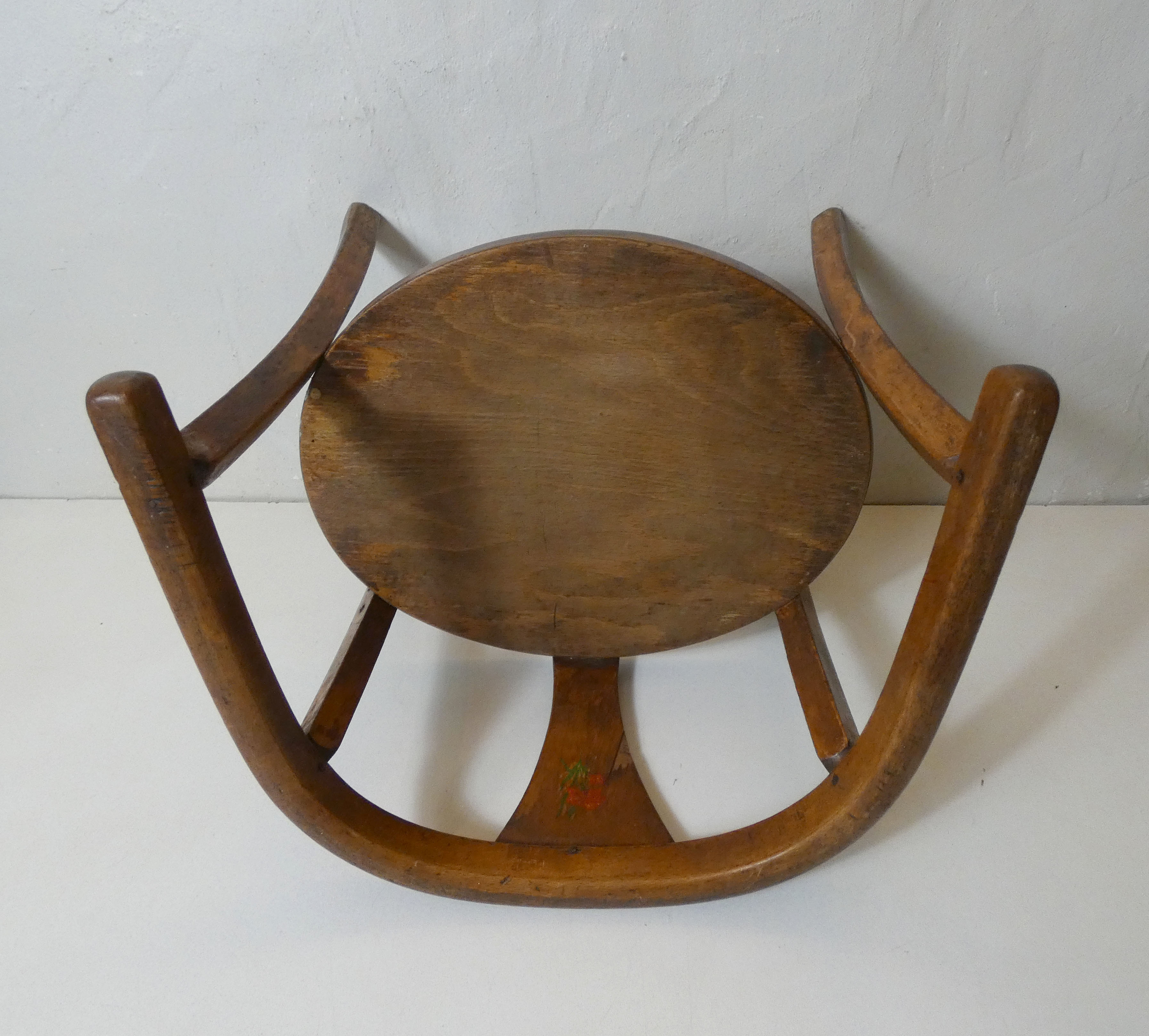 Old wooden armchair for children