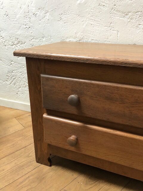 Low oak chest of drawers