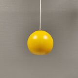 Spherical pendant lamp in sunny yellow.