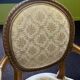 Pair of Louis XVI style armchairs, in solid walnut, re-edged and upholstered, pegged