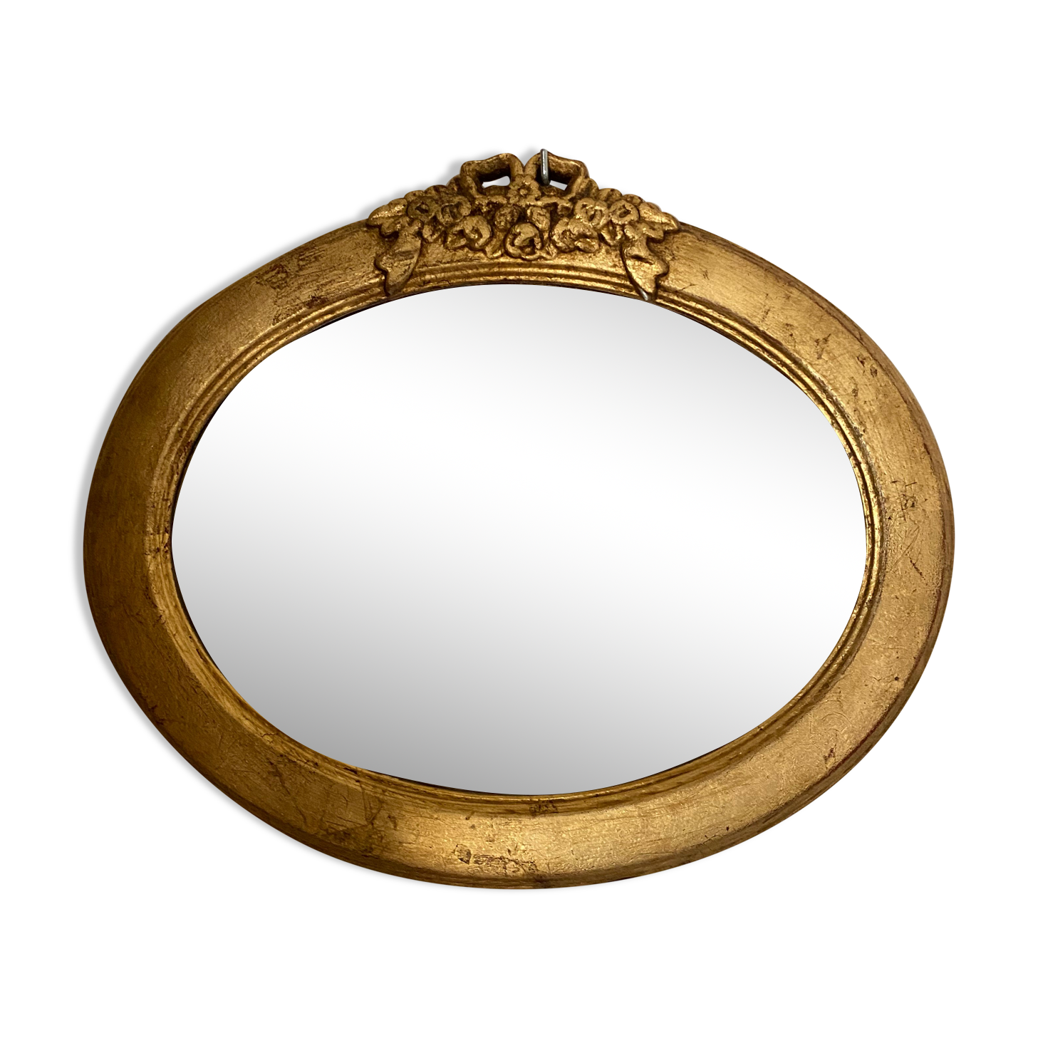 Oval mirror in gilded wood with knot, 32x37 cm
