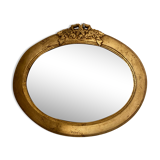 Oval mirror in gilded wood with knot, 32x37 cm