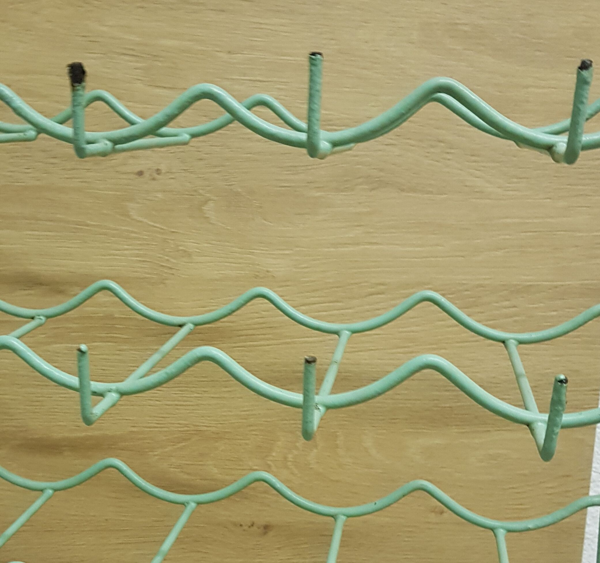 Metal aqua green bottle rack