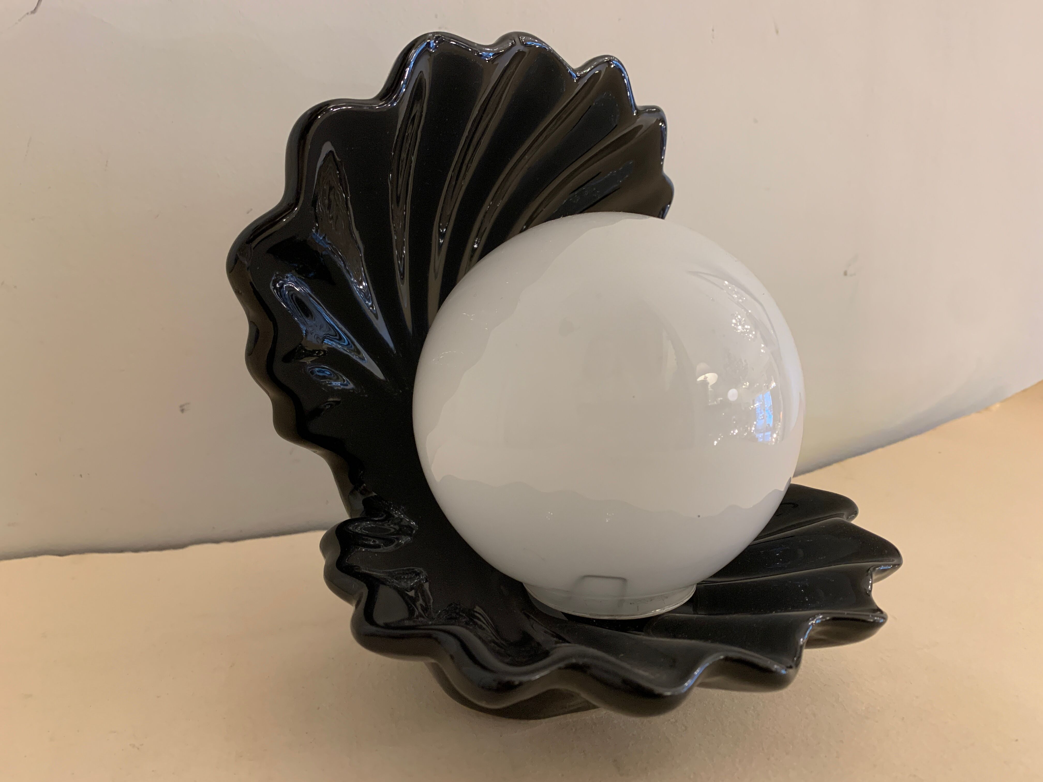 Black ceramic shell lamp and white opaline