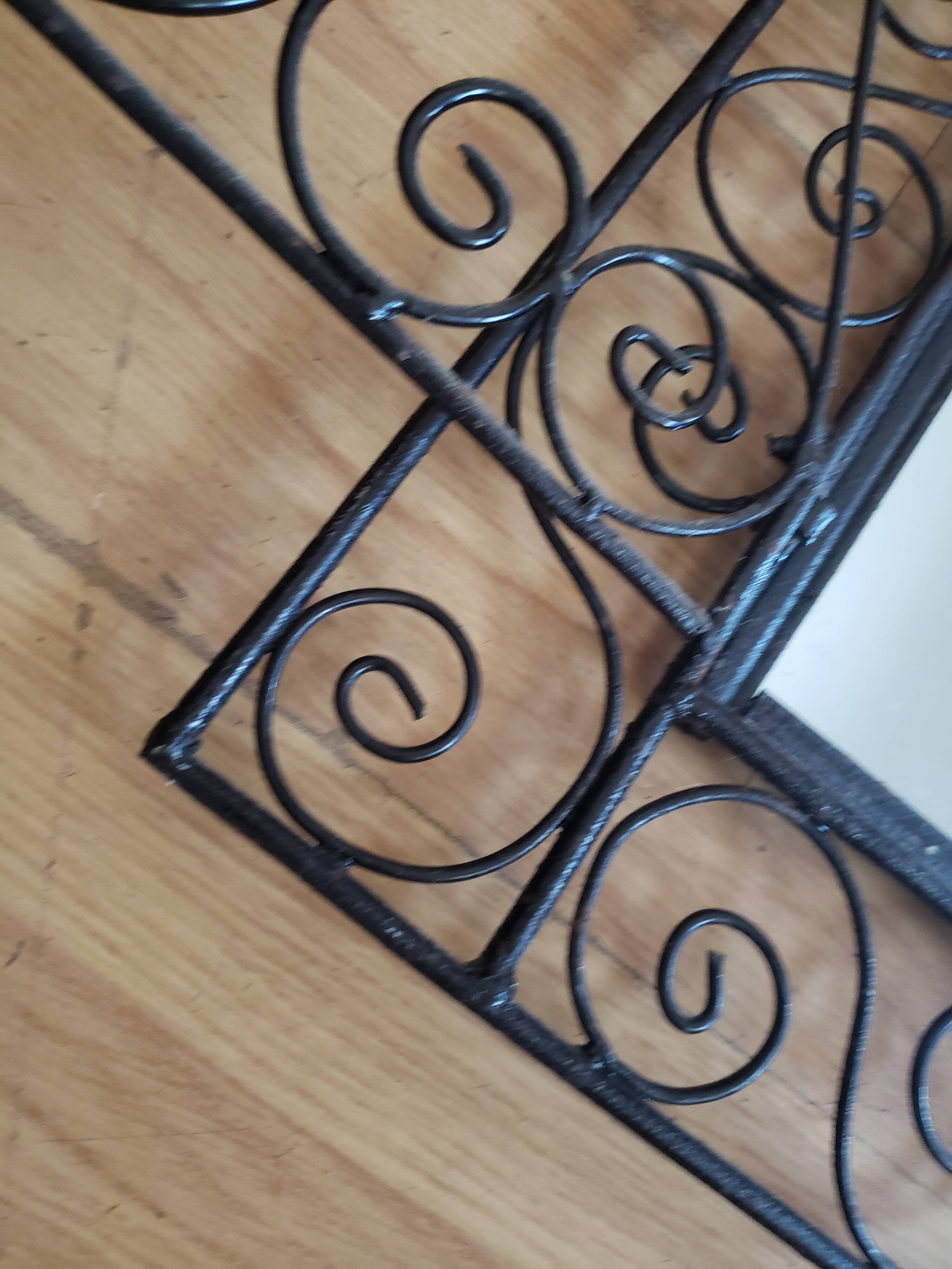 Oriental mirror with wrought iron door