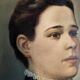 Oil on canvas portrait in an antique gilded wooden frame.