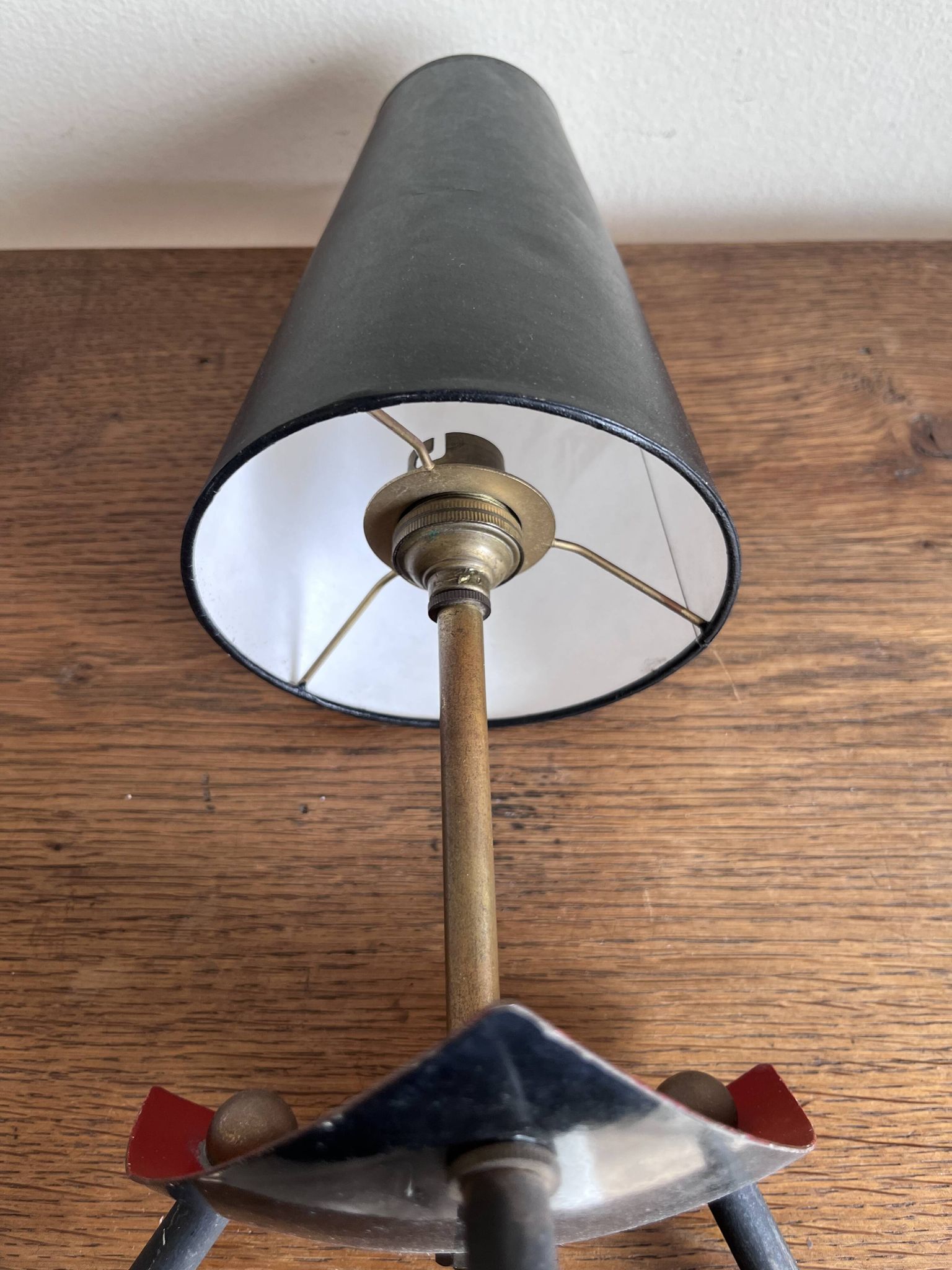 1950s modernist tripod lamp made of sheet metal and brass.