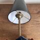 1950s modernist tripod lamp made of sheet metal and brass.