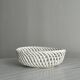 Small twisted porcelain bowl