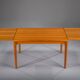 Extendable teak dining table by Henning Kjaernulf for Vejle Stole & Møbelfabrik