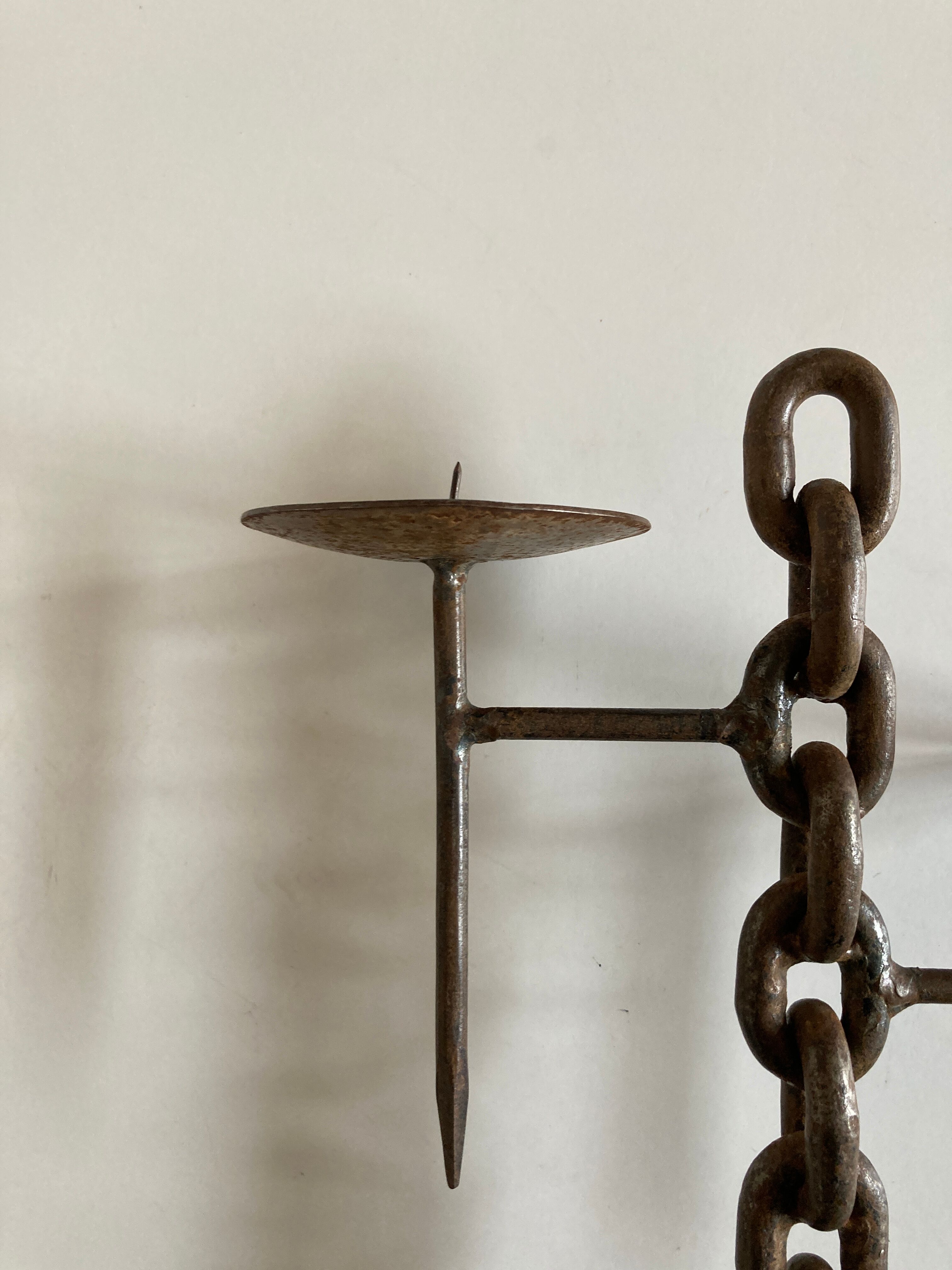 Raw beaten iron candlestick 1970