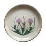 Round dish with thistles