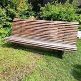 Old wooden bench and wrought iron