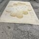 Large rug with floral decoration.