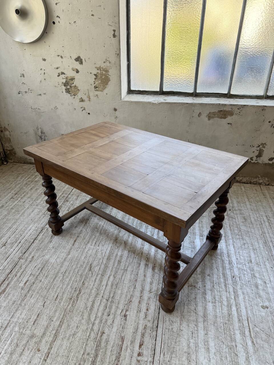 Paneled walnut desk with turned legs, 1900