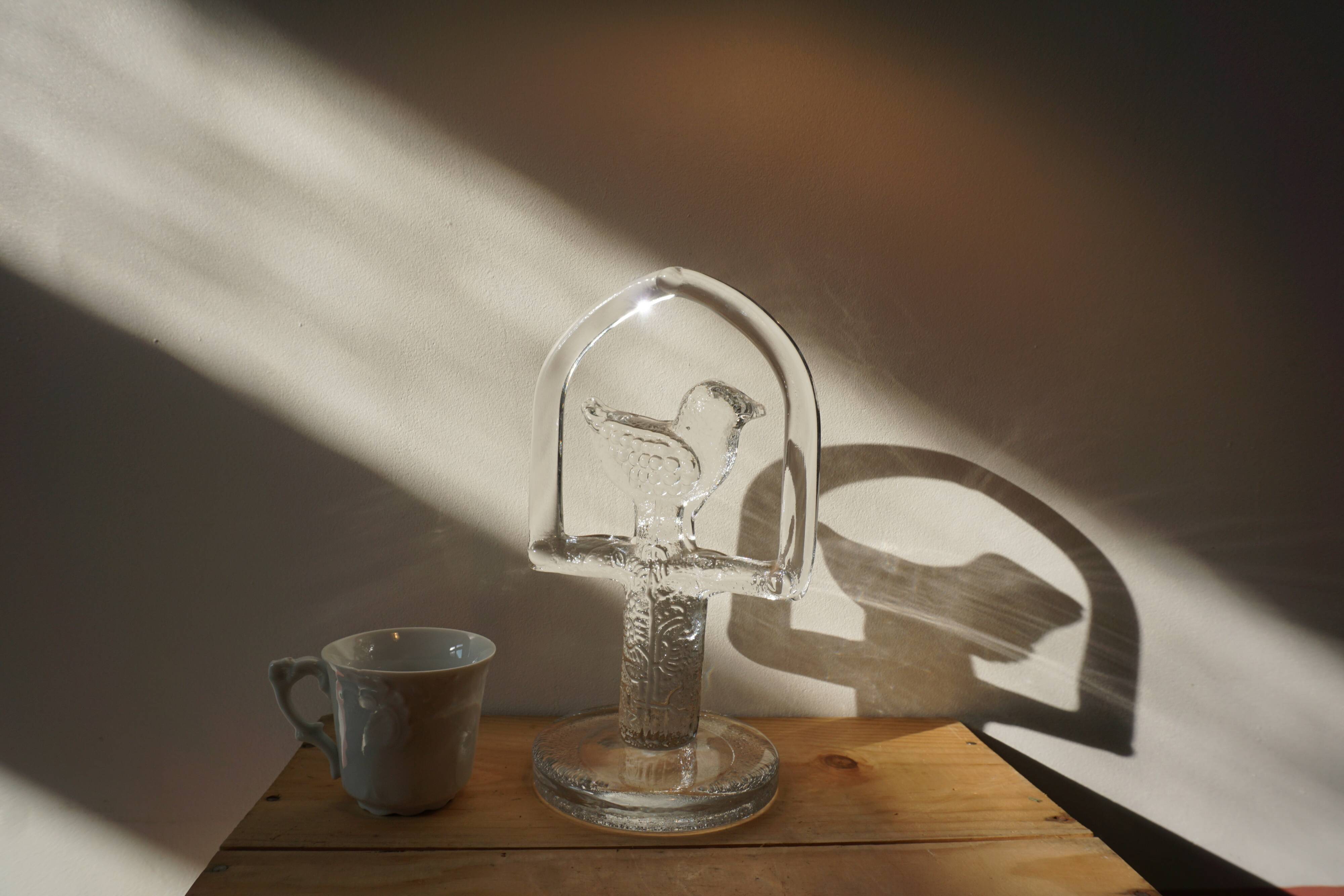 Glass bird suncatcher sculpture