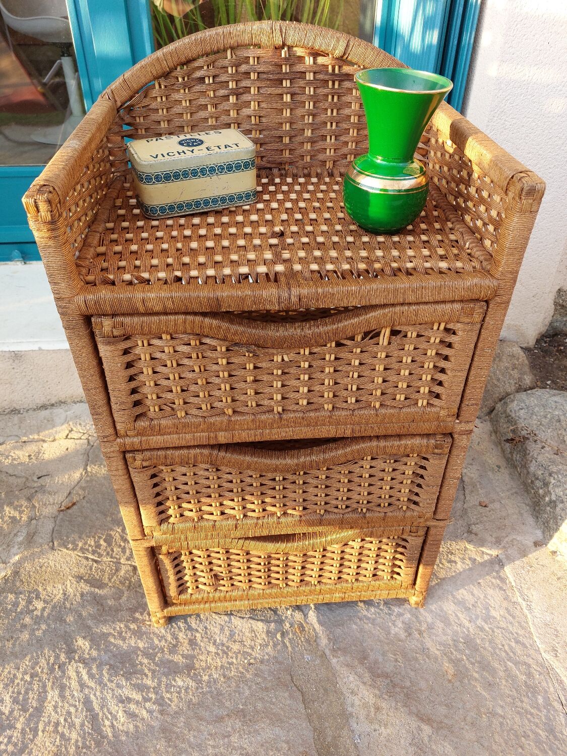 Wicker chest of drawers and rope