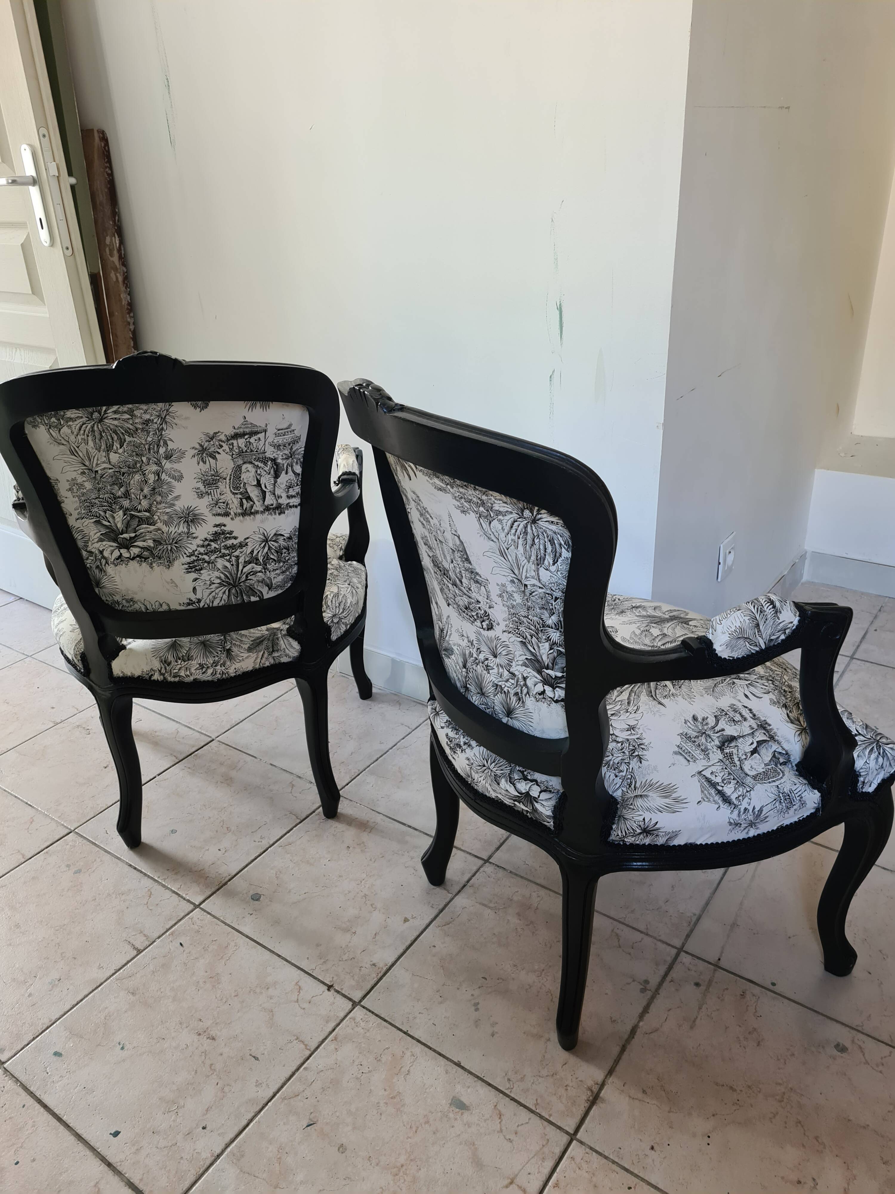 Armchairs Louis XV black woodwork lined with junggle fabrics