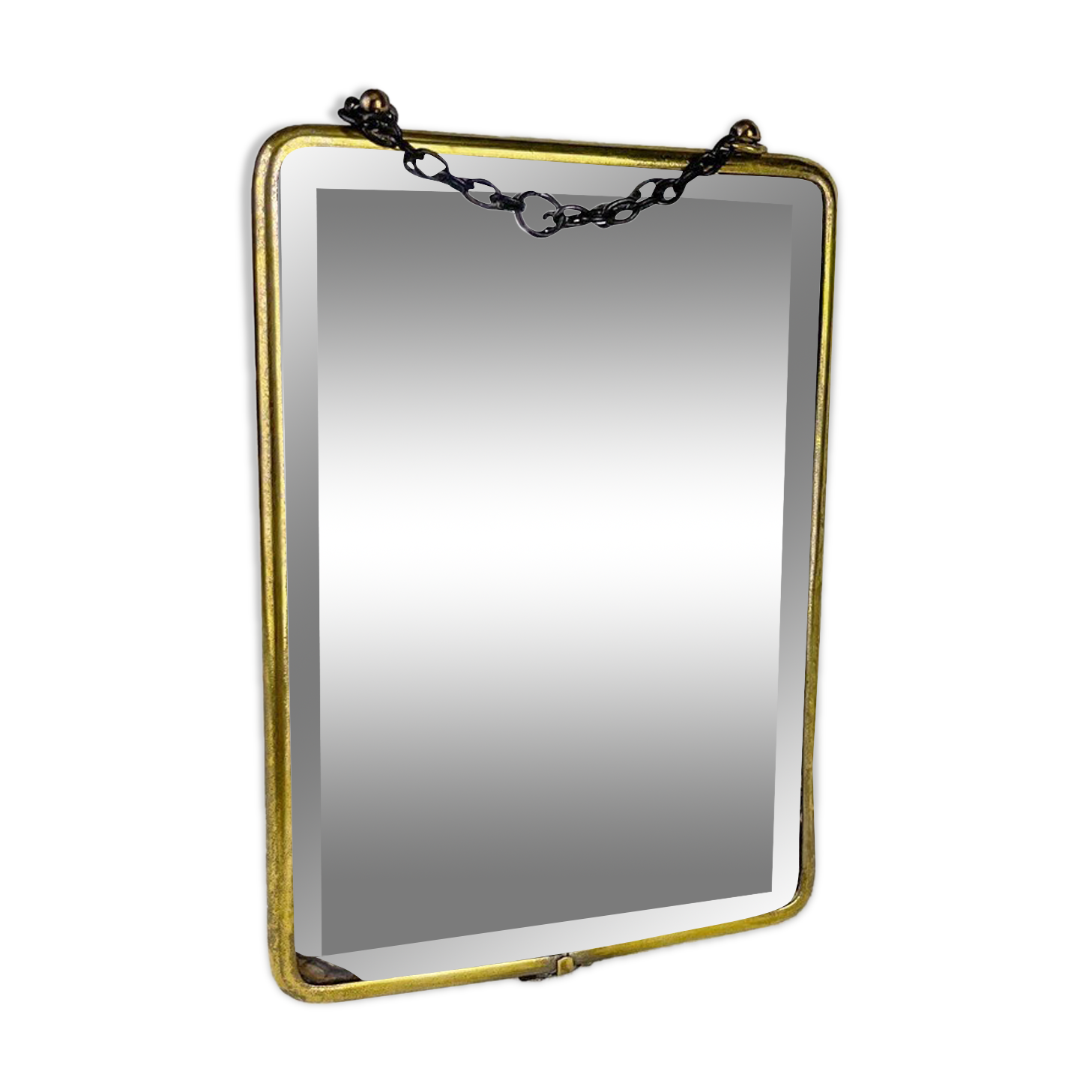 Old barber mirror in brass and beveled glass