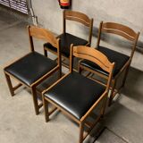 Set of four vintage chairs with retro design skai seats