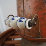 Copper umbrella holder and porcelain handles