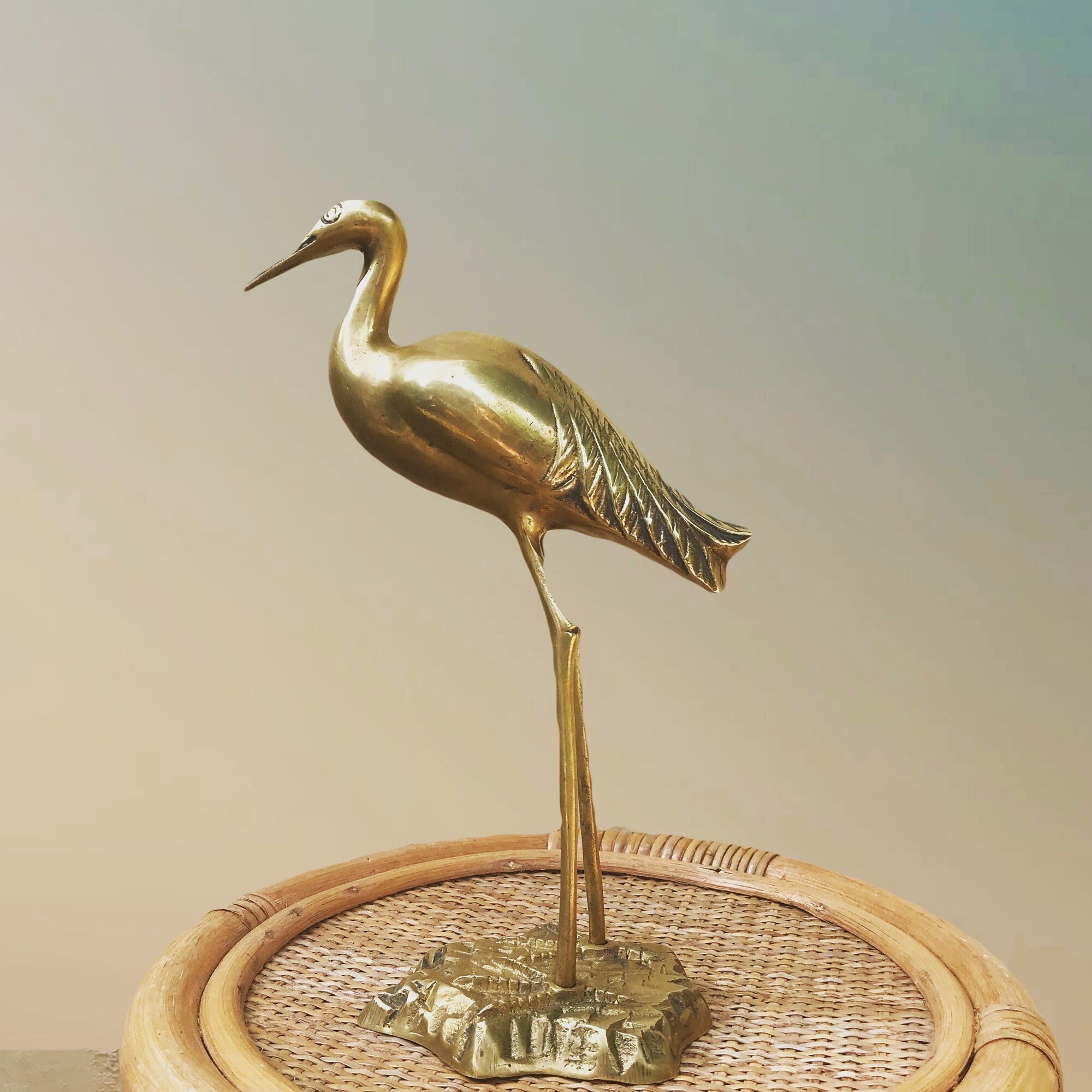 Heron in brass