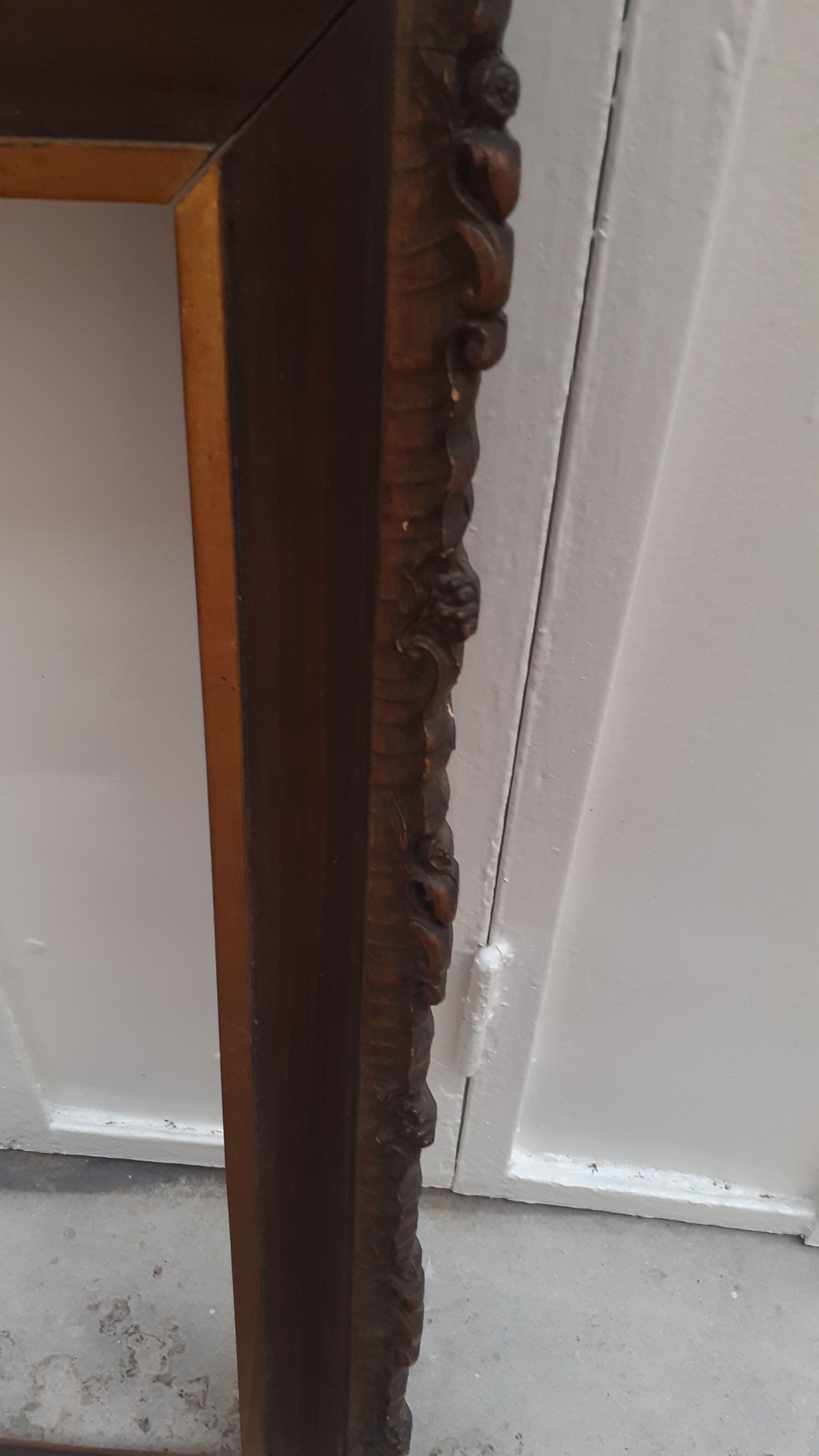 Carved frame with gilding