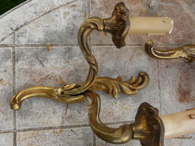 Two pairs of bronze wall lamps