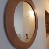 Round wall mirror made of solid wood