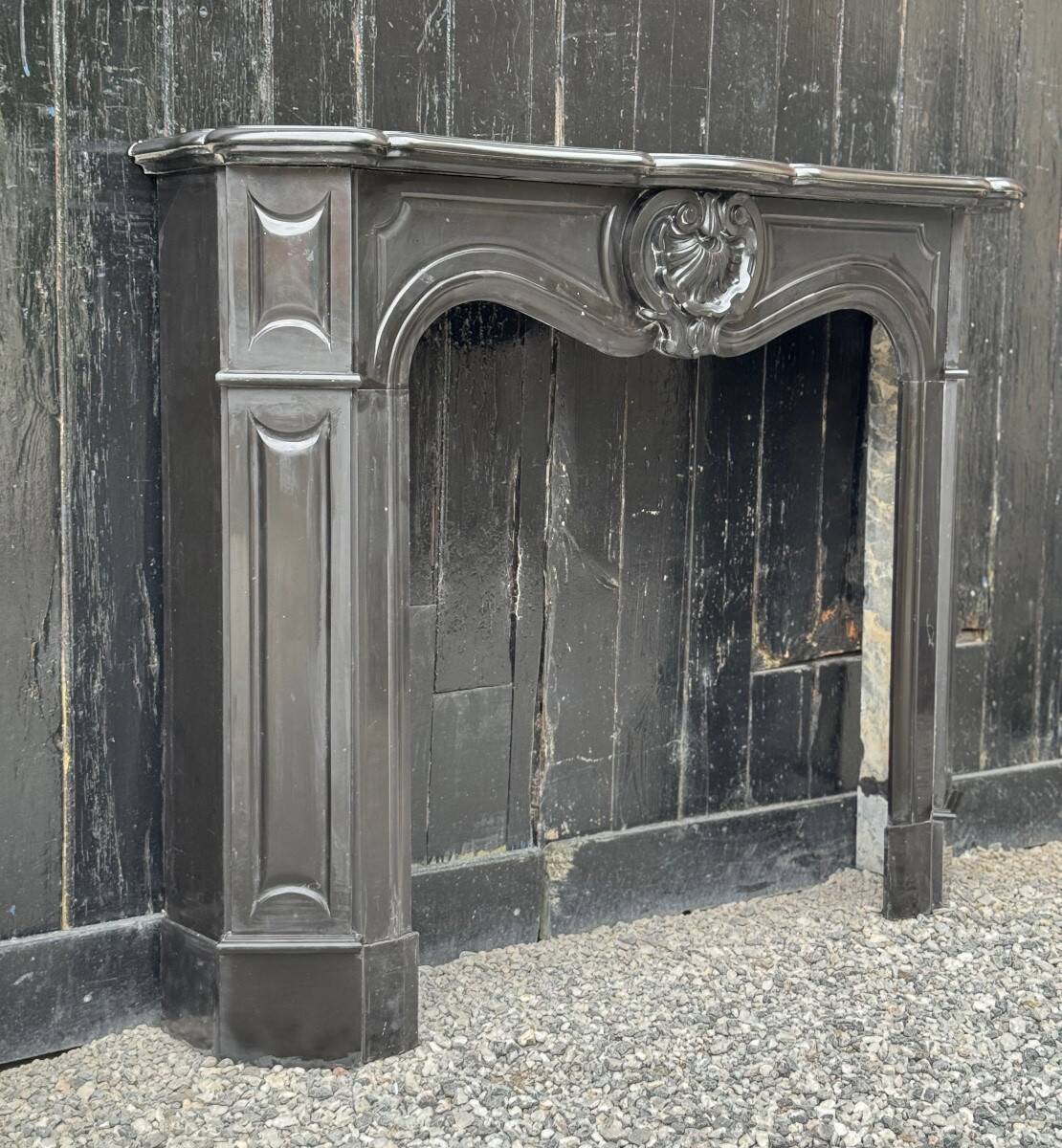 Louis XV style fireplace in black Belgian marble, circa 1880