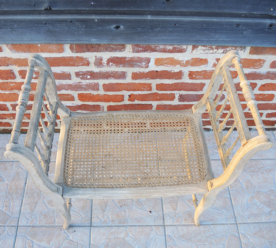 Antique Napoleon III piano bench in wood and cane.