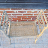 Antique Napoleon III piano bench in wood and cane.