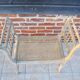 Antique Napoleon III piano bench in wood and cane.
